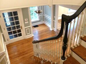 A stair landing with beautiful woodwork